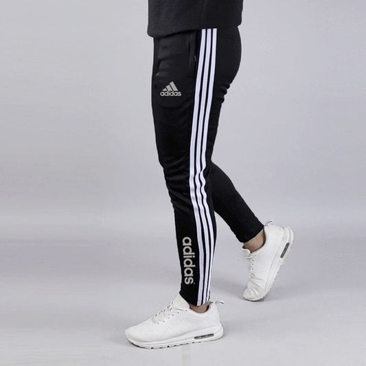 Adidas Essentials 3-Stripes Tapered Pants – Black